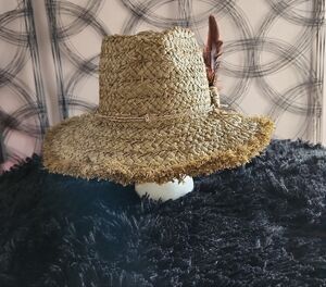 Stylish Tan Straw Hat with Feather Accent